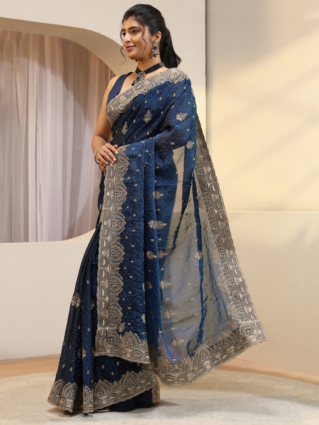  Peacock Blue Tissue Saree With Embellished Border 