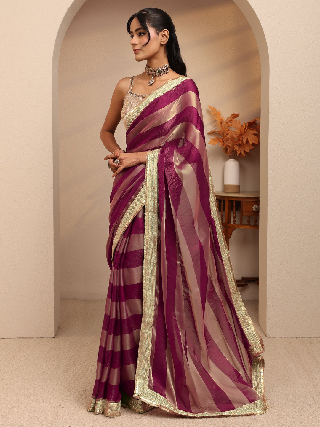  Burgundy Striped Textured Tissue Saree 