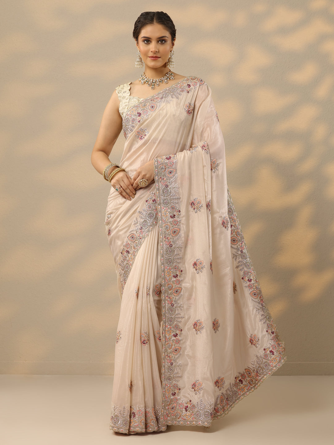  Cream Embroidered Crepe Saree With Unstitched Blouse Piece 