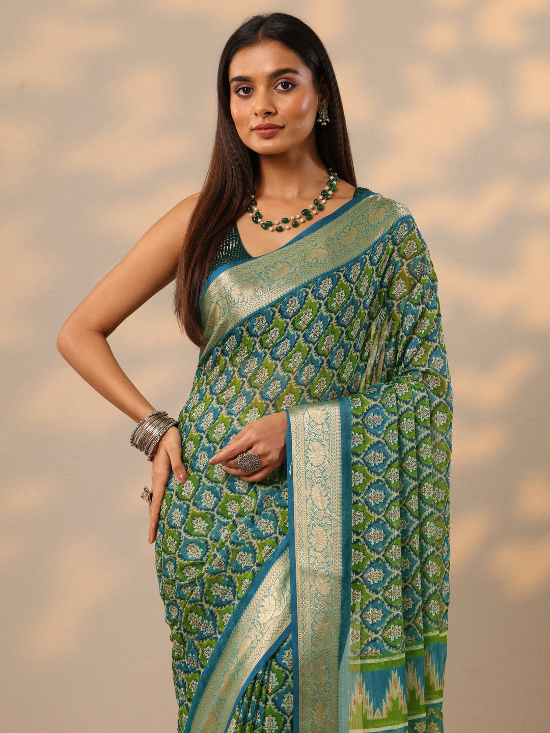  Teal Printed Georgette Saree With Unstitched Blouse Piece 