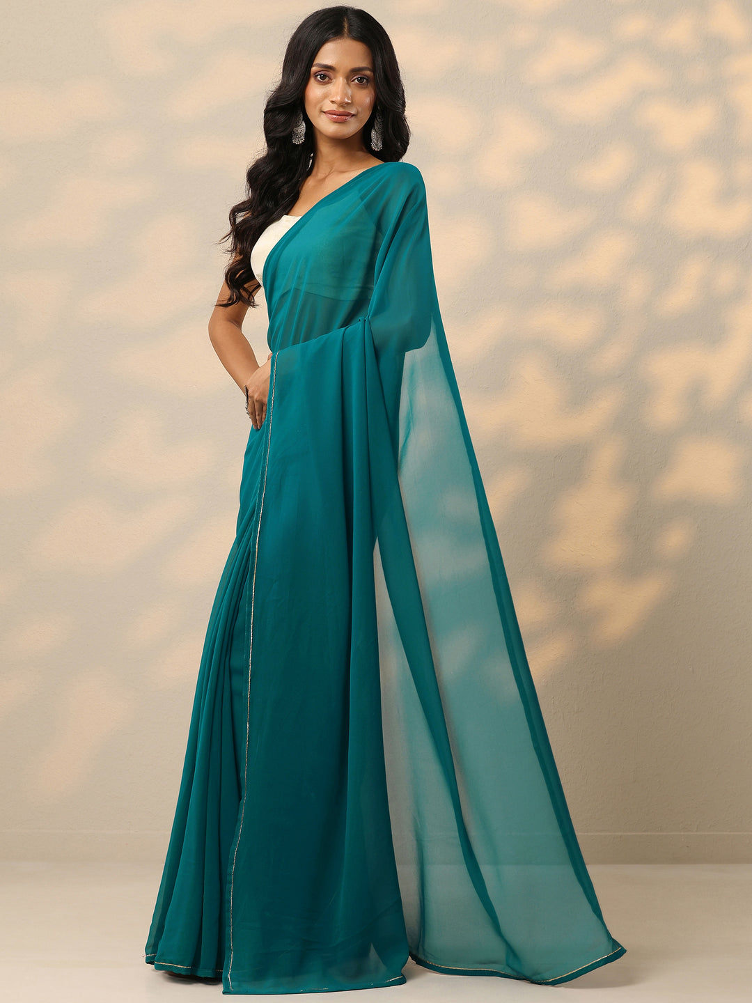  Teal Solid Georgette Saree With Unstitched Blouse Piece 