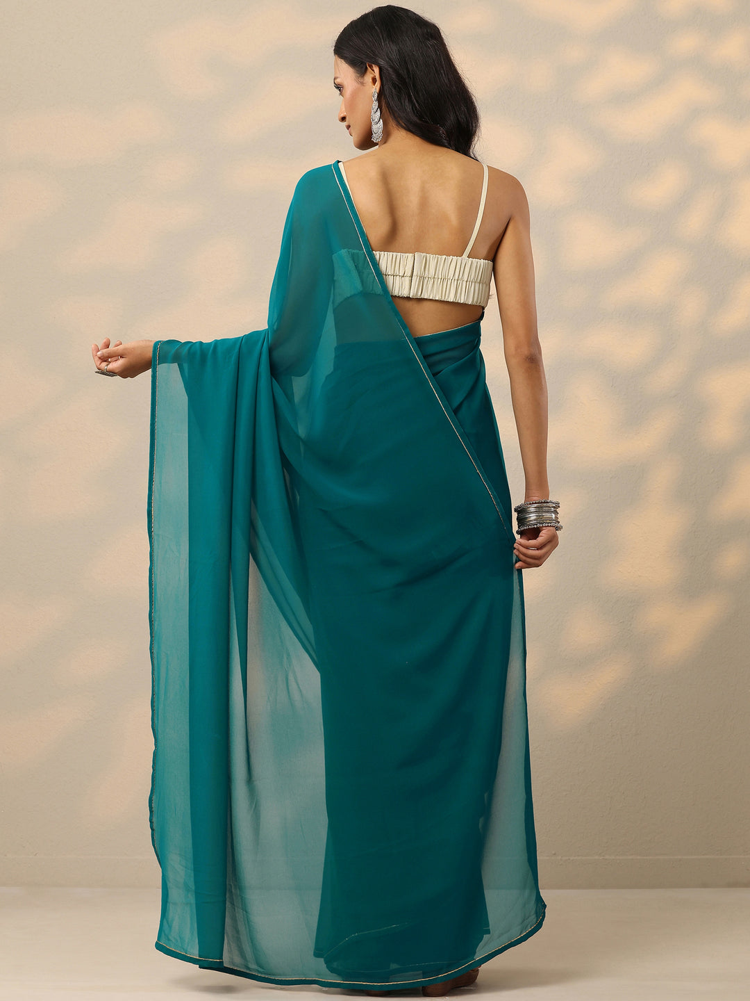  Teal Solid Georgette Saree With Unstitched Blouse Piece 