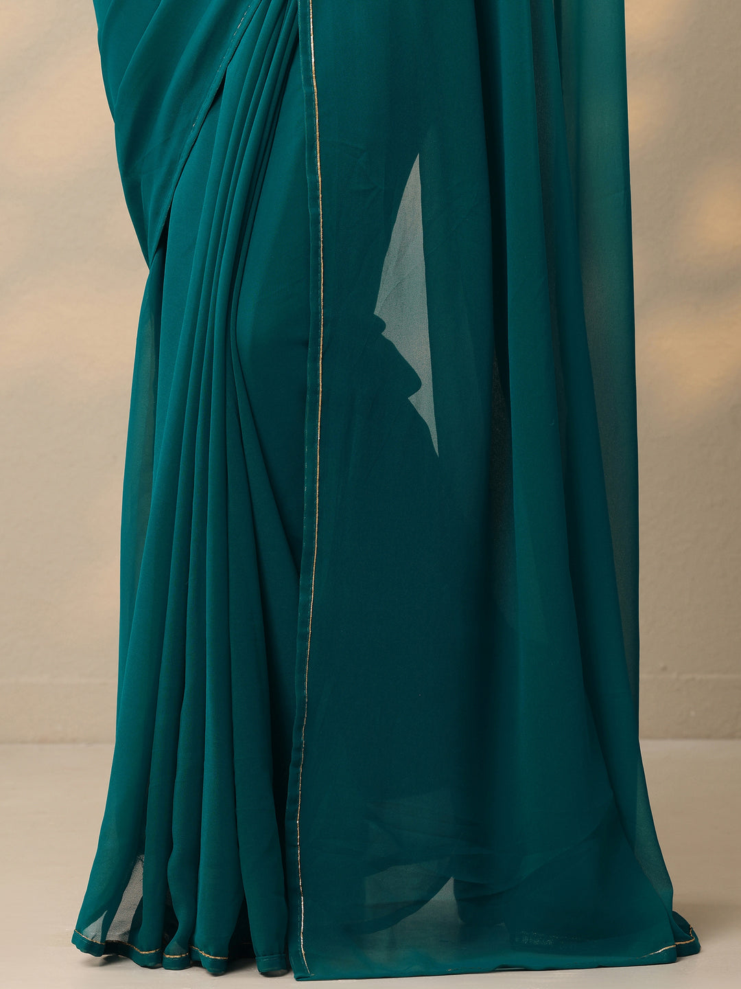  Teal Solid Georgette Saree With Unstitched Blouse Piece 