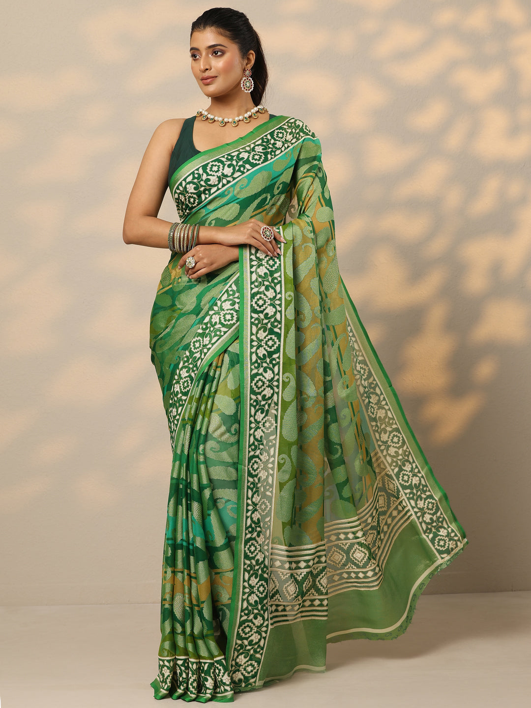  Green Printed Georgette Saree With Unstitched Blouse Piece 