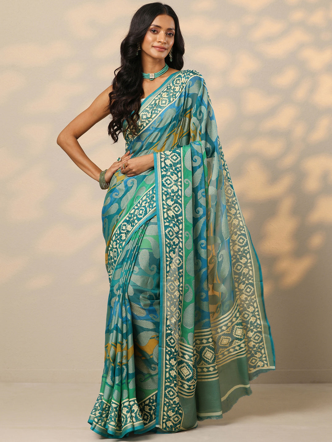  Teal Printed Georgette Saree With Unstitched Blouse Piece 
