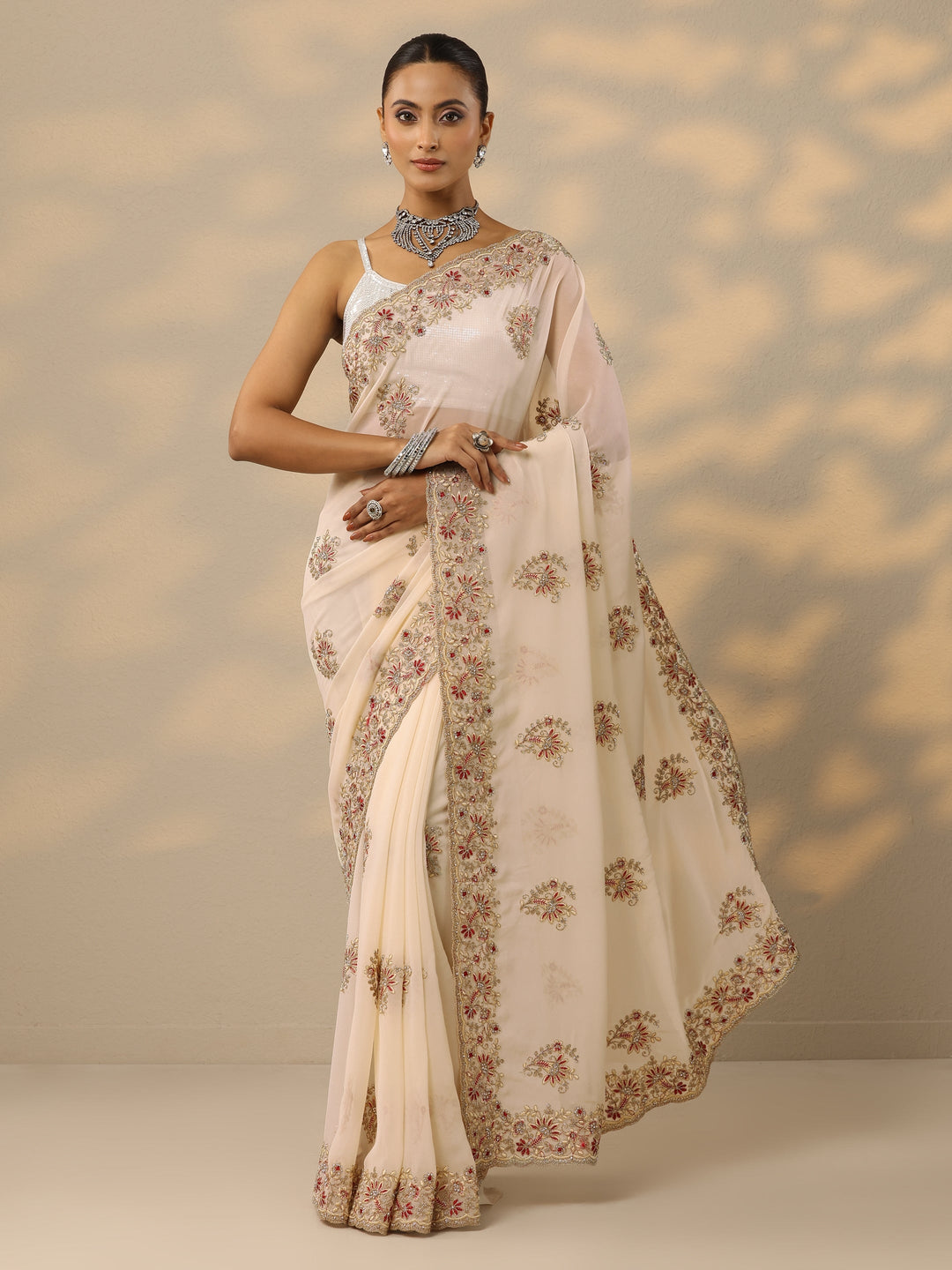  Cream Embellished Georgette Saree With Unstitched Blouse Piece 
