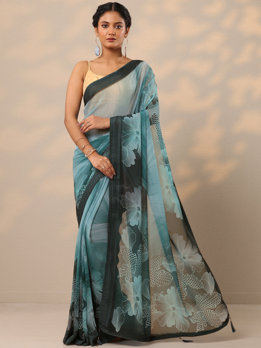 Teal Printed Georgette Saree With Unstitched Blouse Piece