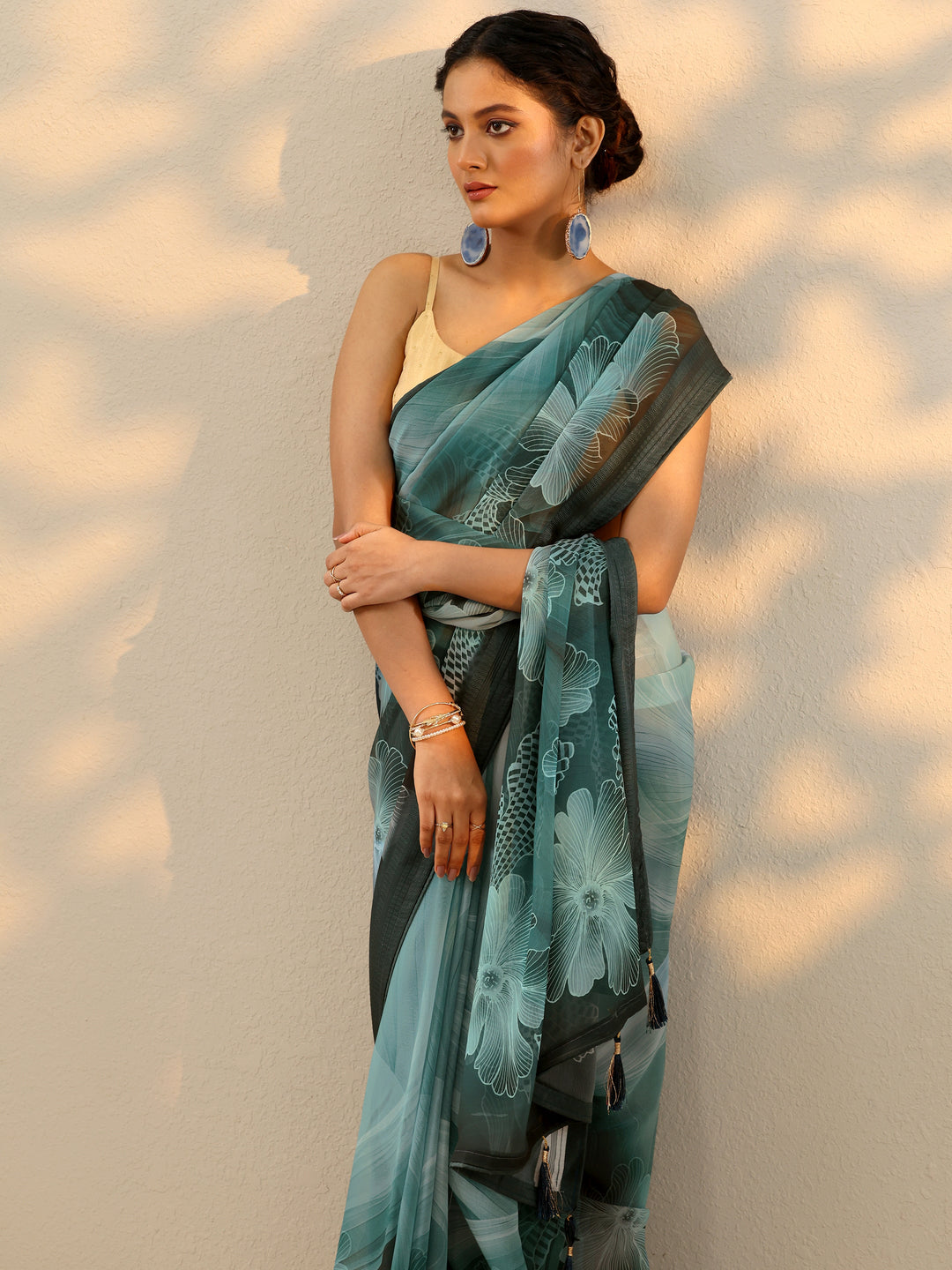  Teal Printed Georgette Saree With Unstitched Blouse Piece 