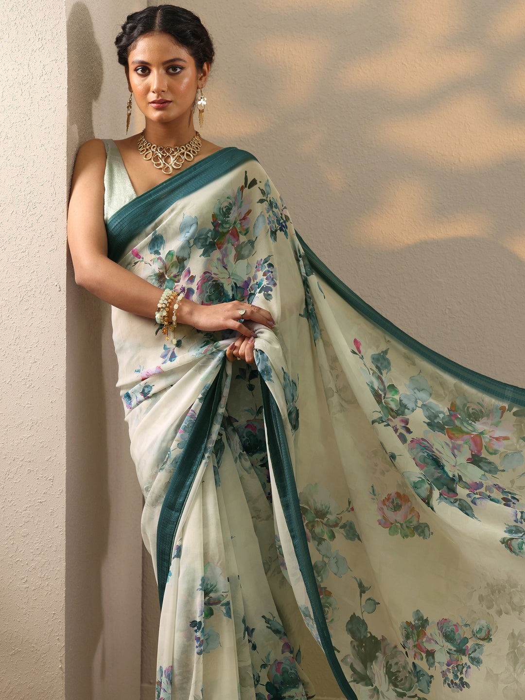 Teal Printed Georgette Saree With Unstitched Blouse Piece