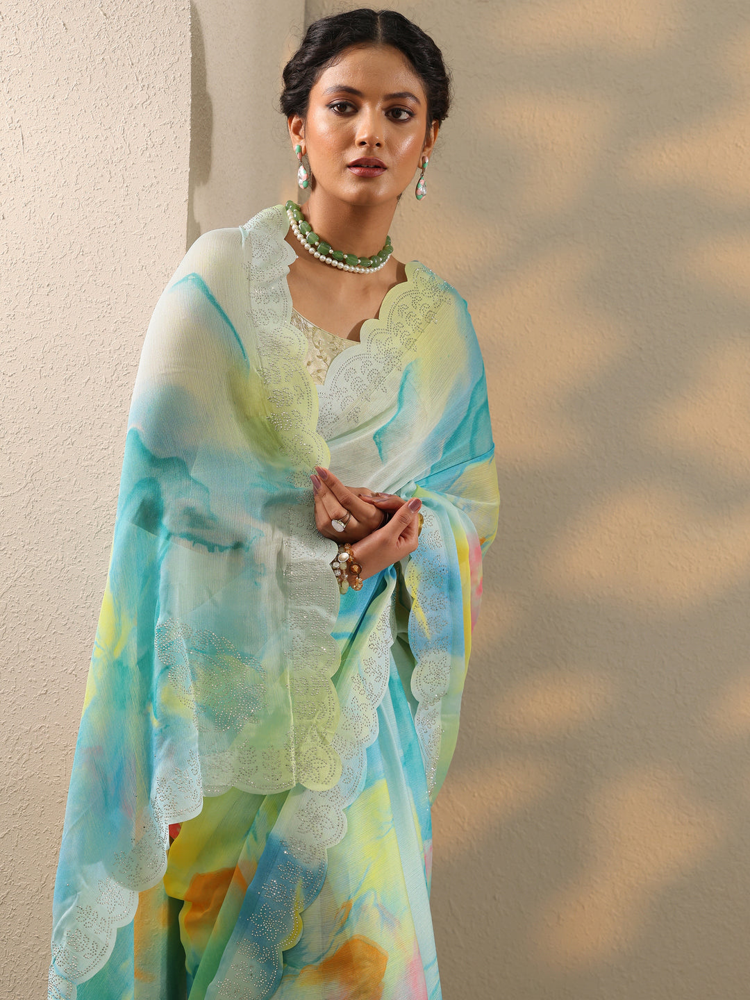  Turquoise blue Embellished Chinon Saree With Unstitched Blouse Piece 