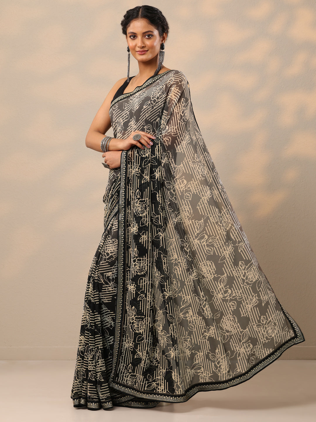  Black Printed Georgette Saree With Unstitched Blouse Piece 