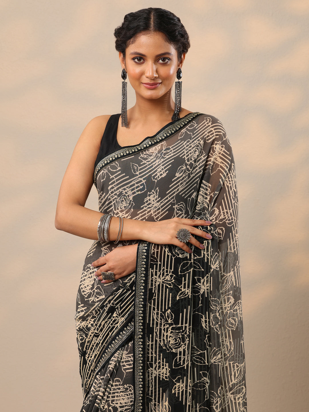  Black Printed Georgette Saree With Unstitched Blouse Piece 