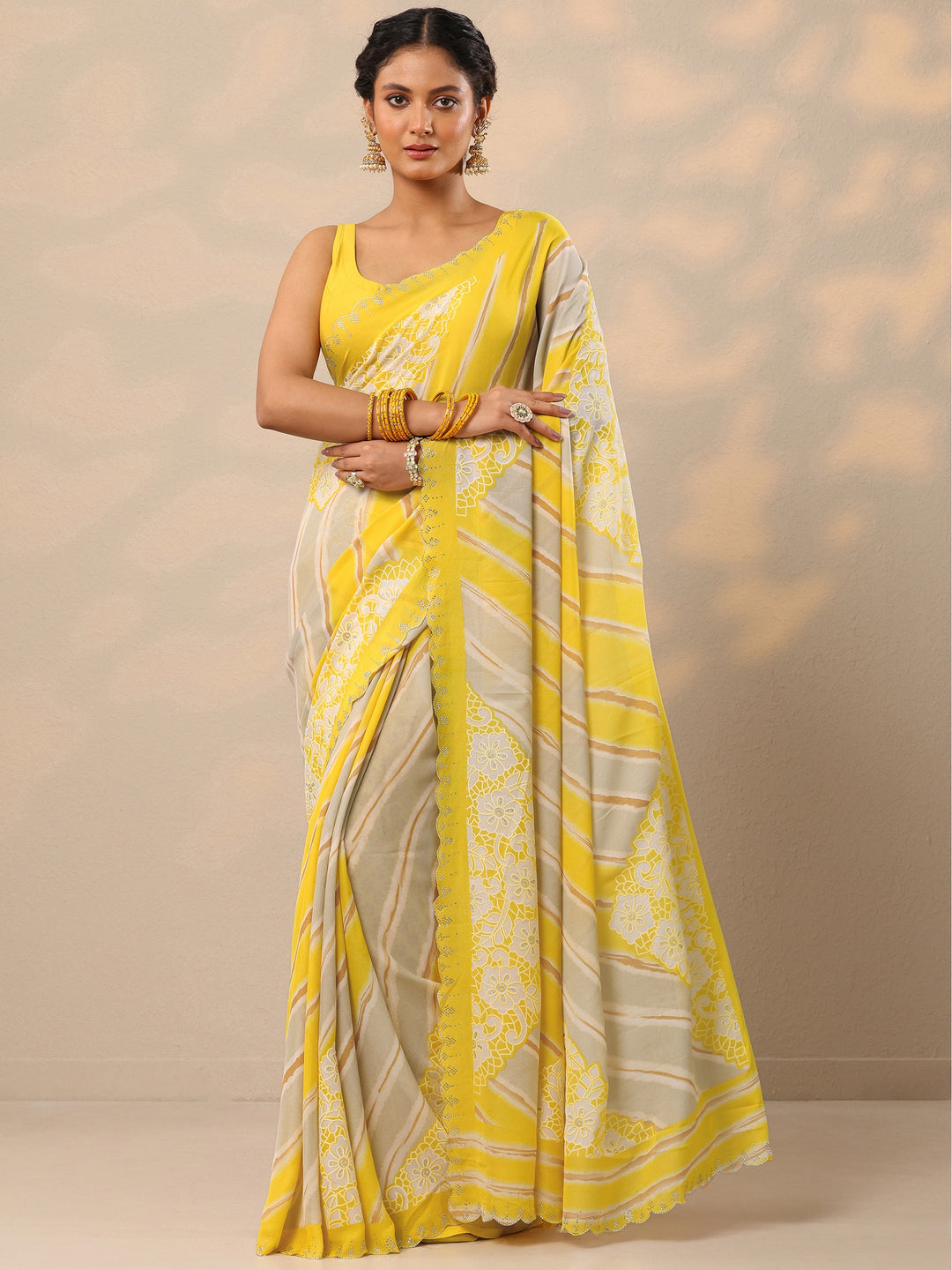  Yellow Leheriya Printed Georgette Saree With Unstitched Blouse Piece 