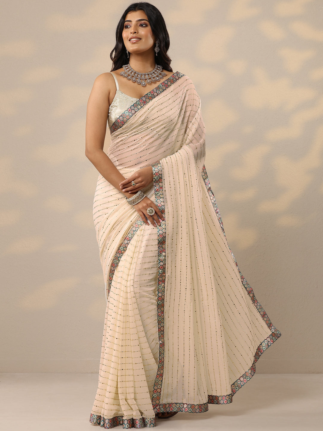  Cream Embellished Georgette Sarees With Unstitched Blouse Piece 