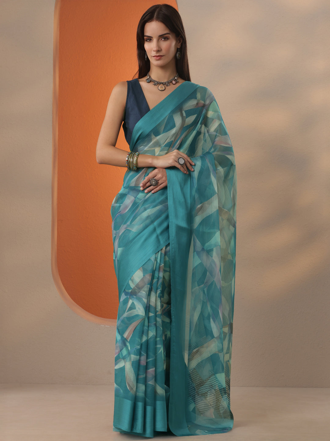  Teal Printed Chinon Saree With Unstitched Blouse Piece 