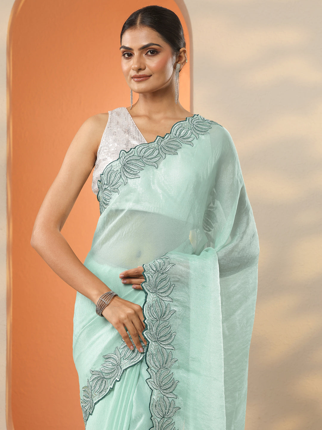  Green Solid Organza Saree With Unstitched Blouse Piece 