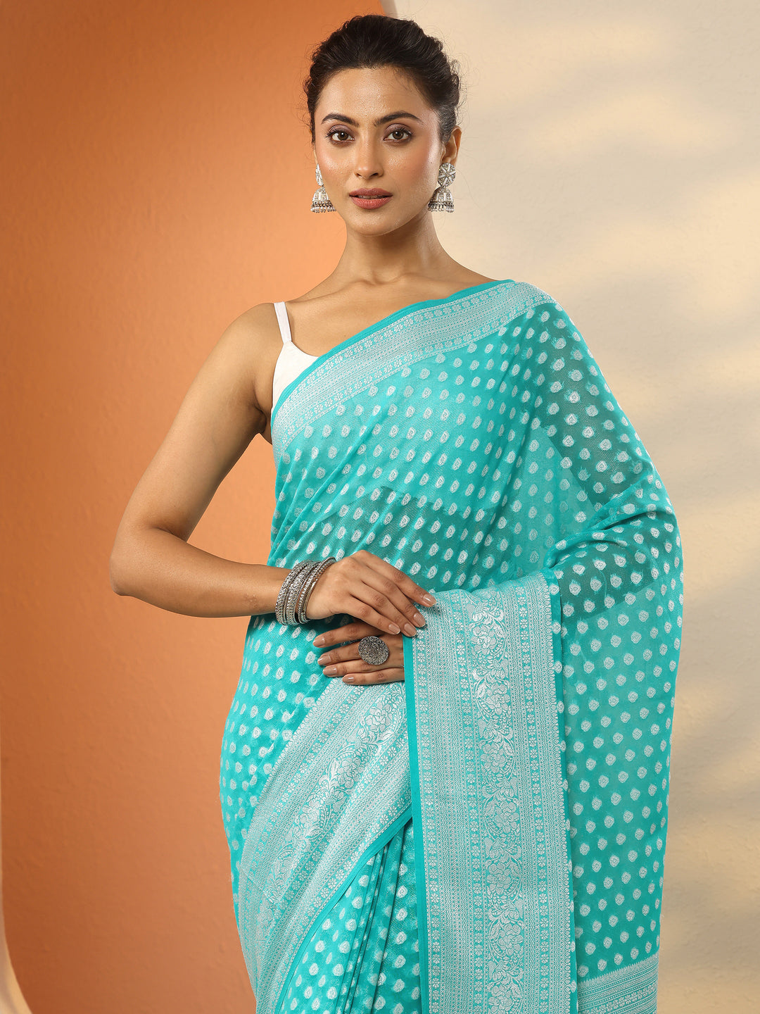  Green Woven Design Pure Georgette Saree With Unstitched Blouse Piece 