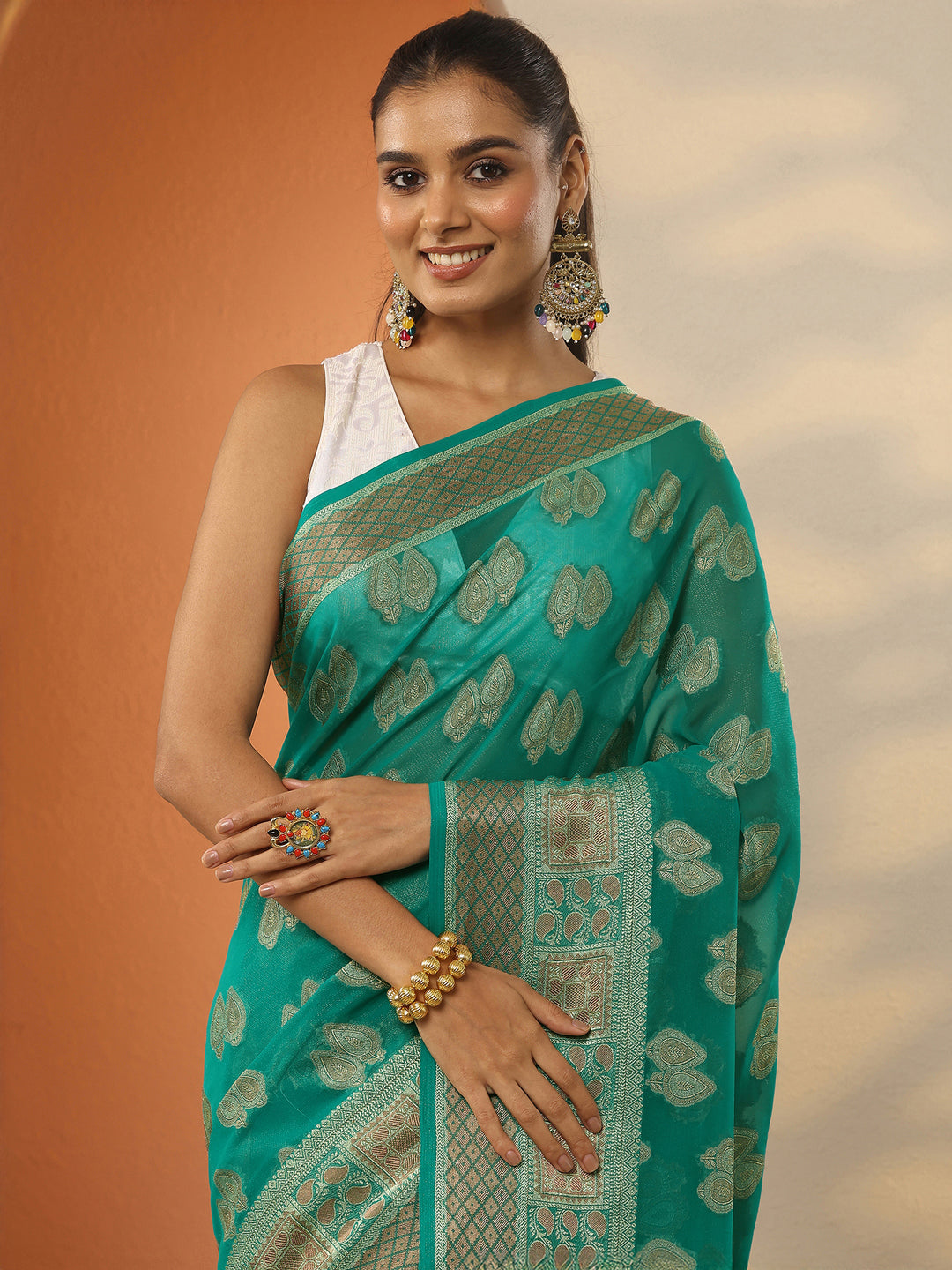  Green Woven Design Pure Georgette Saree With Unstitched Blouse Piece 