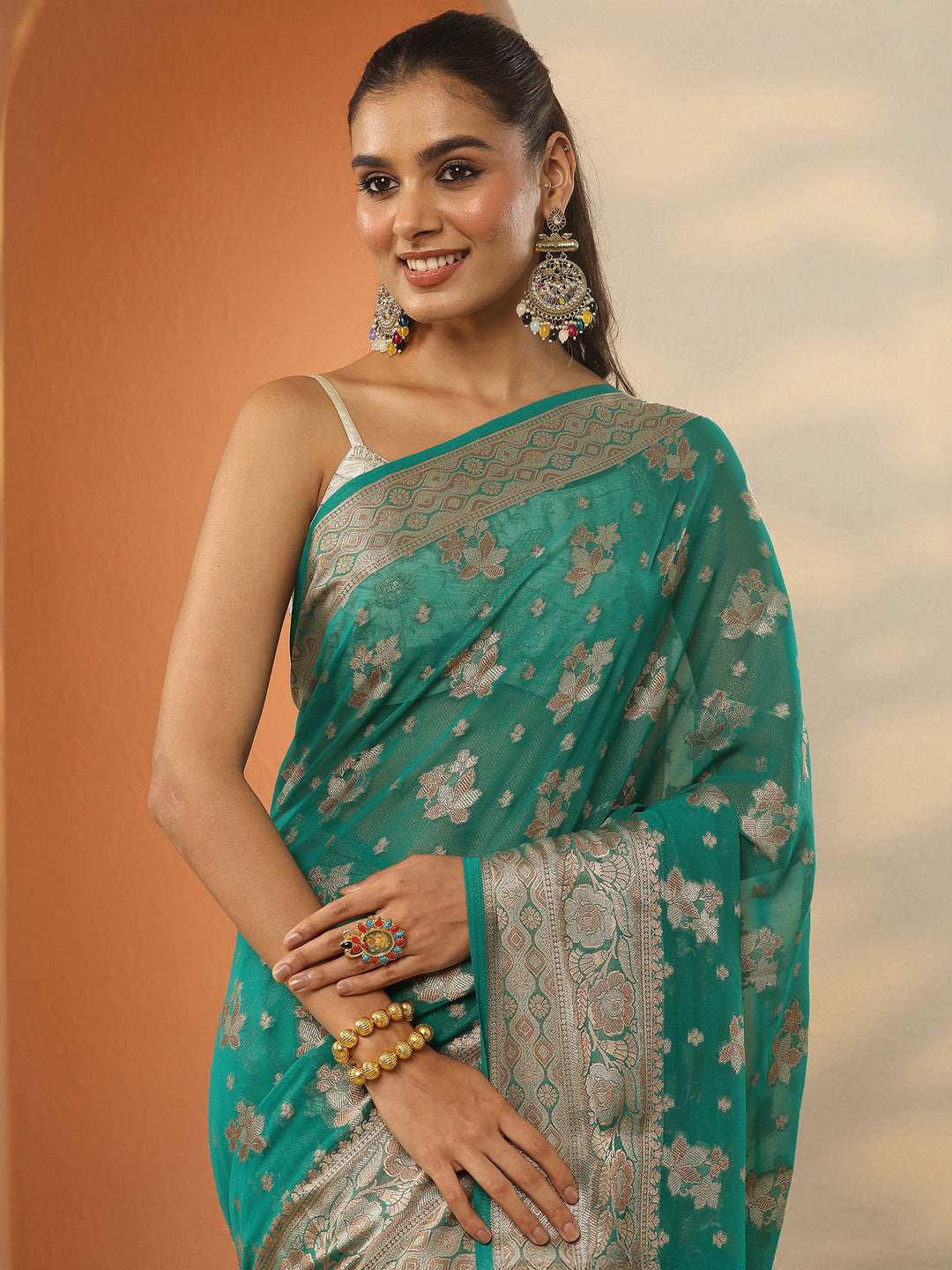  Green Woven Design Pure Georgette Saree With Unstitched Blouse Piece 