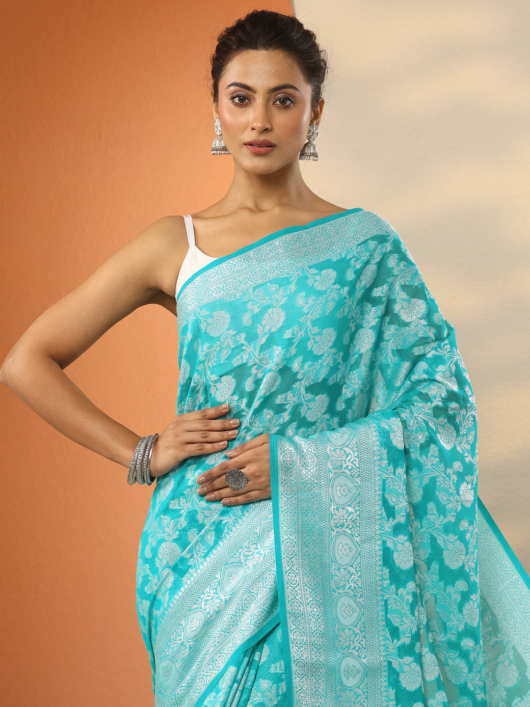  Green Woven Design Pure Georgette Saree With Unstitched Blouse Piece 