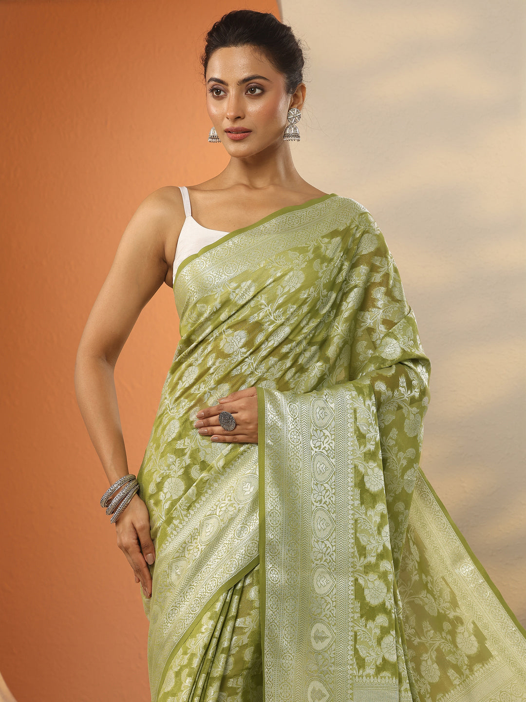  Green Woven Design Pure Georgette Saree With Unstitched Blouse Piece 
