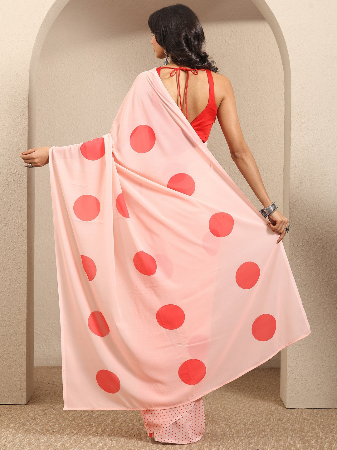  Peach Geometric Printed Georgette Saree With Unstitched Blouse Piece 