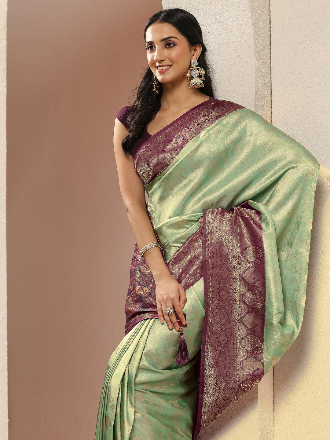 Sea Green Woven Design Silk Blend Sarees With Unstitched Blouse Piece