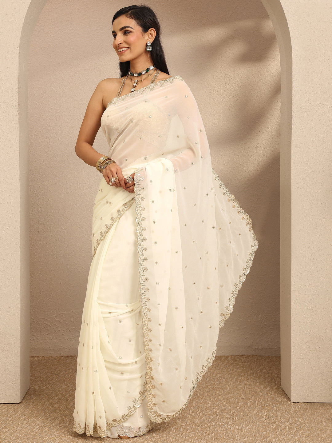  Cream Embroidered Georgette Saree With Unstitched Blouse Piece 
