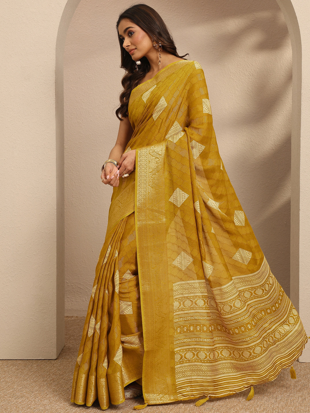  Mustard Paisley Woven Design Georgette Saree With Unstitched Blouse Piece 