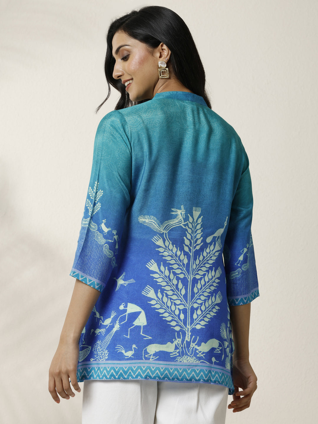  Blue Humanoid Printed Muslin Straight Short Kurti 