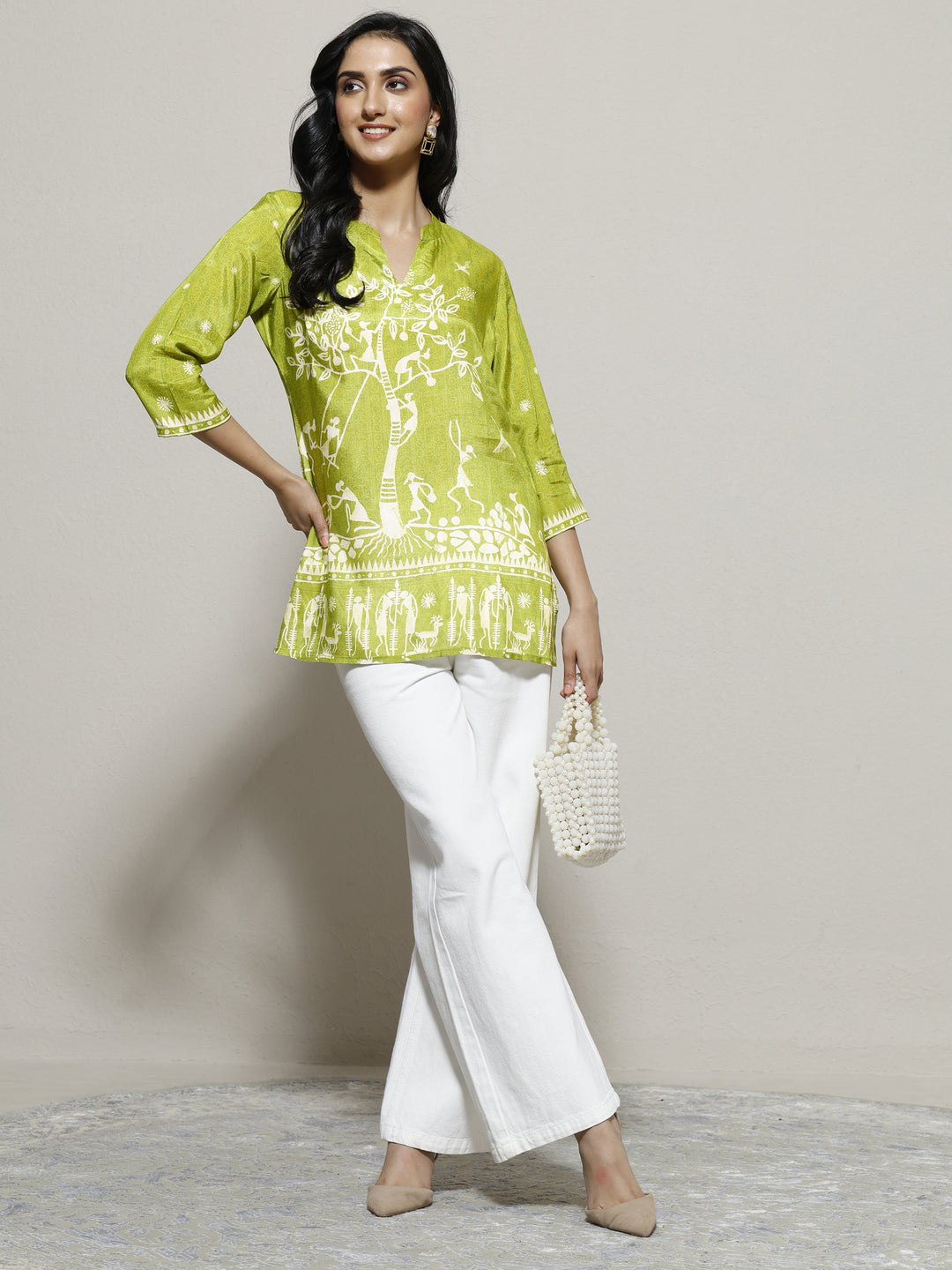  Green Humanoid Printed Muslin Straight Short Kurti 