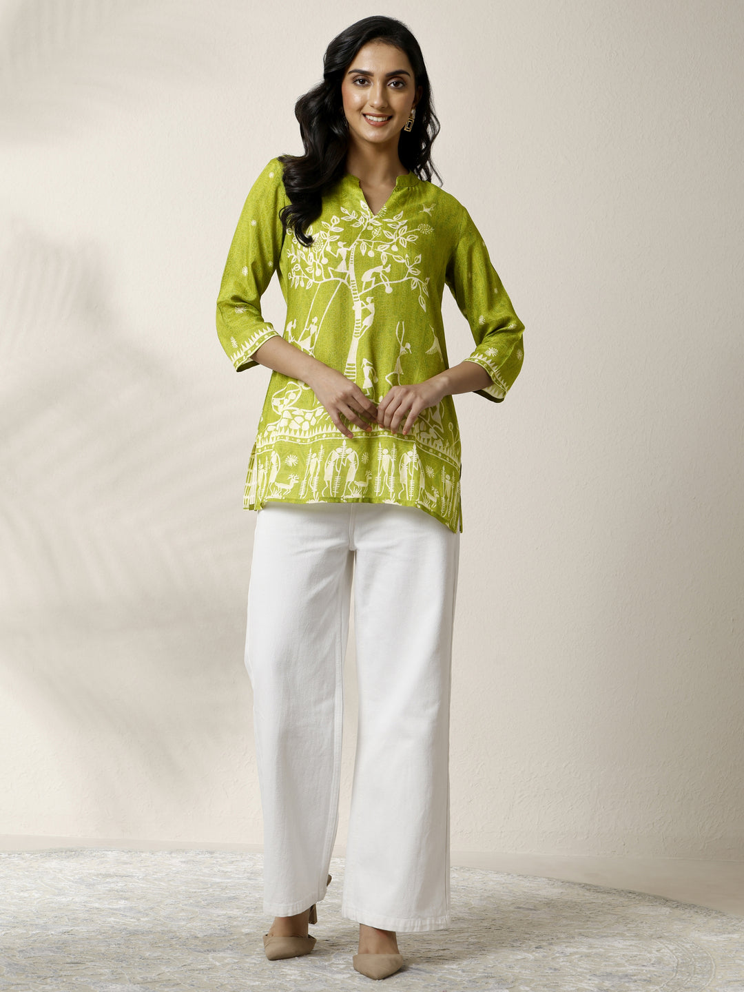  Green Humanoid Printed Muslin Straight Short Kurti 