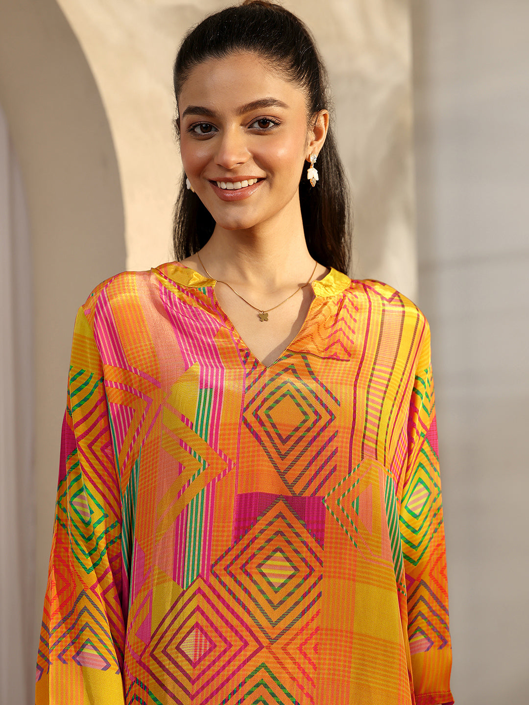  Mustard Geometric Printed Crepe Straight Short Kurti 