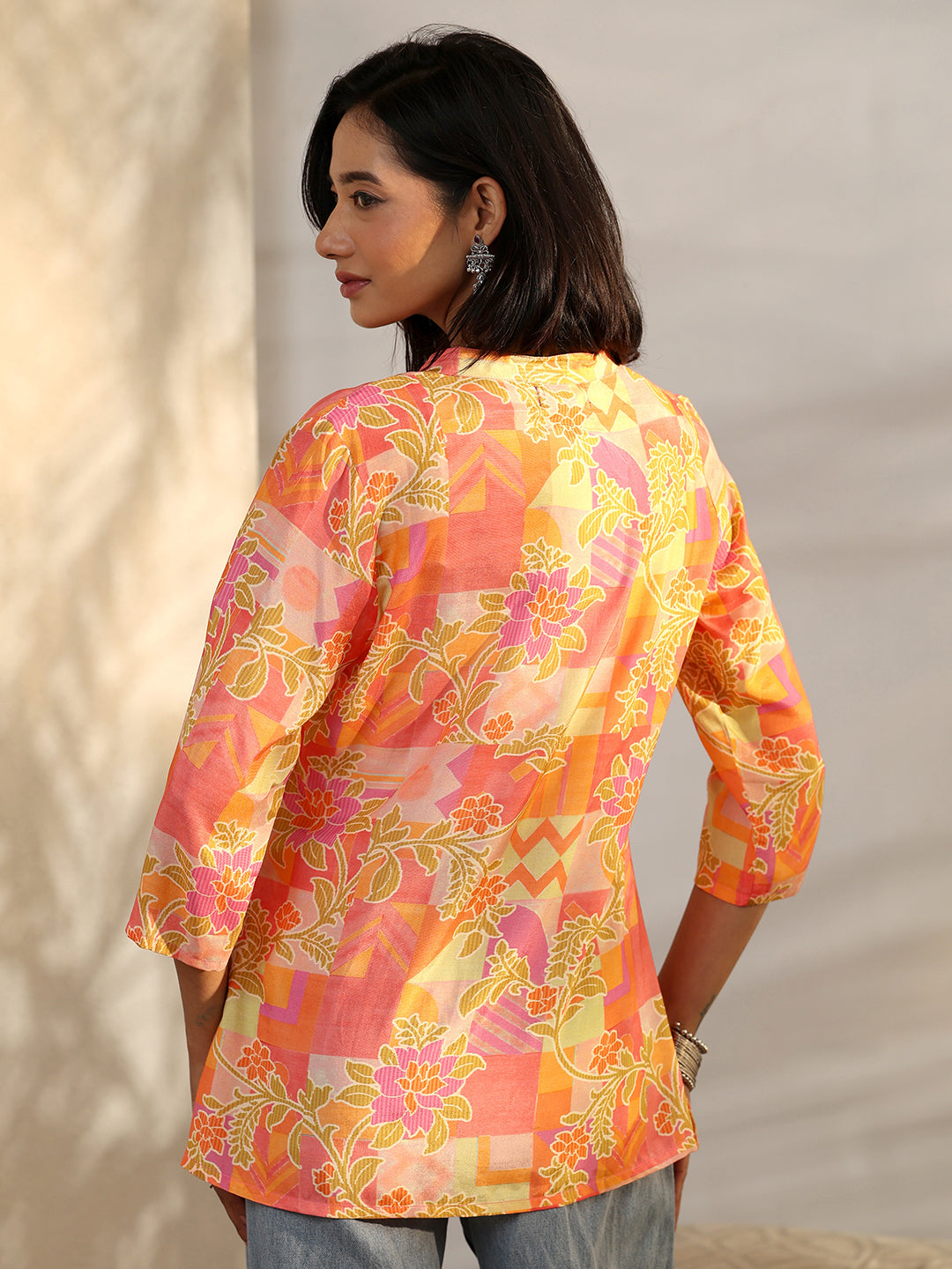  Orange Printed Muslin Straight Short Kurti 