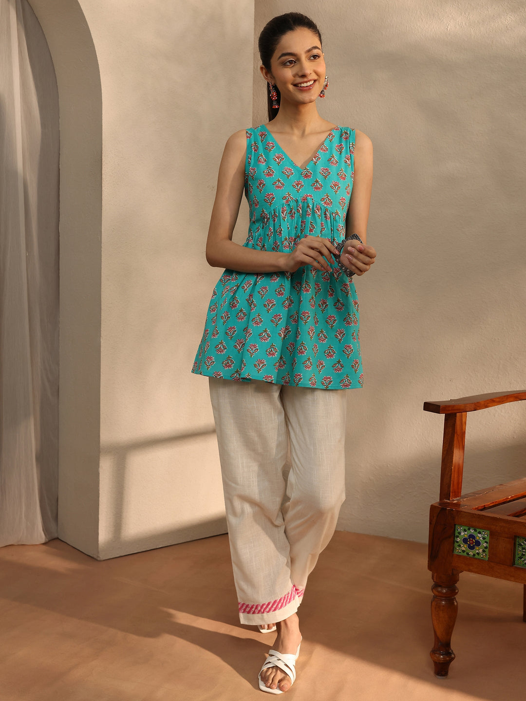  Turquoise blue Printed Cotton Blend A-Line Short Kurti 