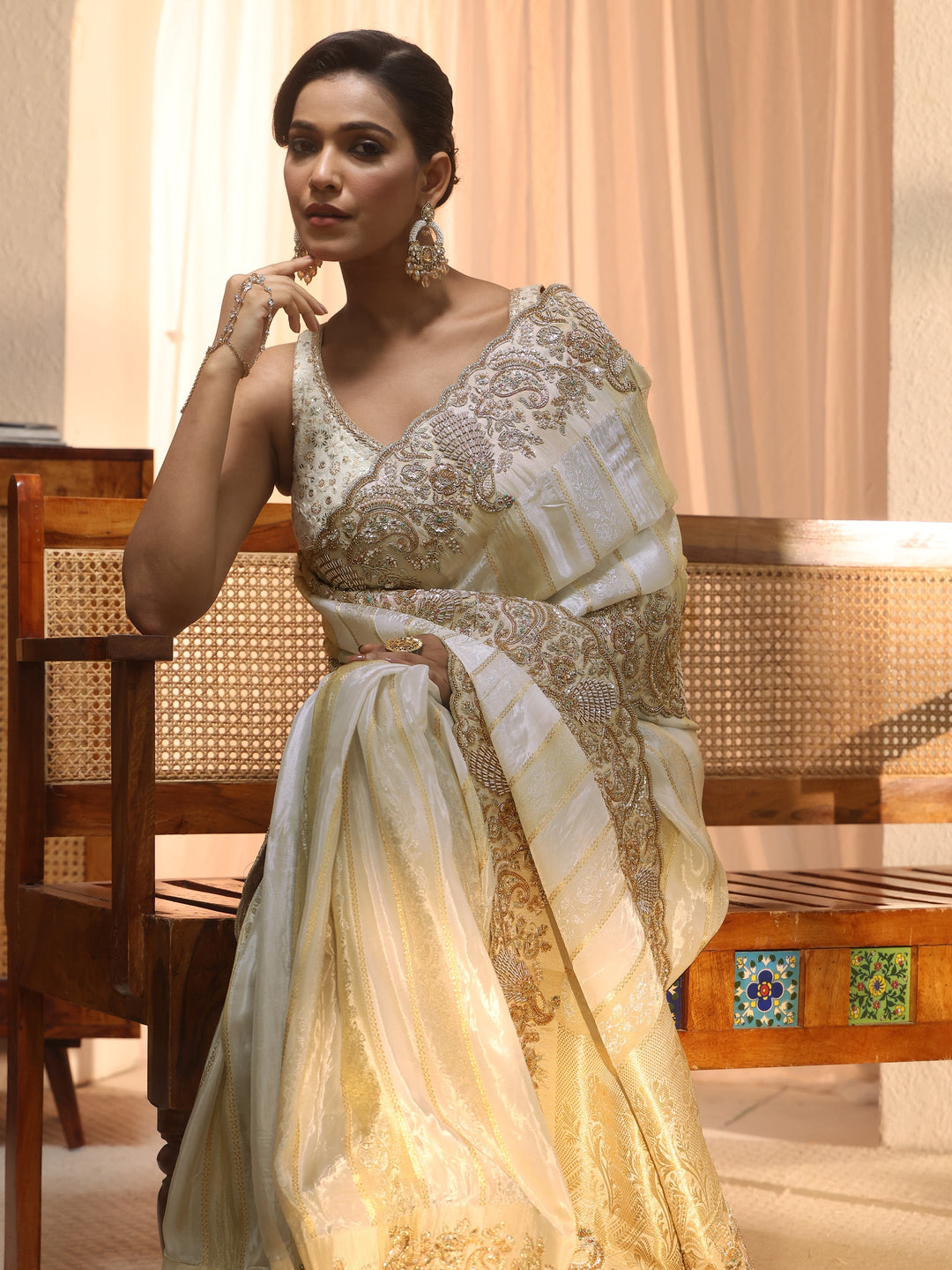  Libas Art Cream Woven Design Tissue Saree with Embellished Border 