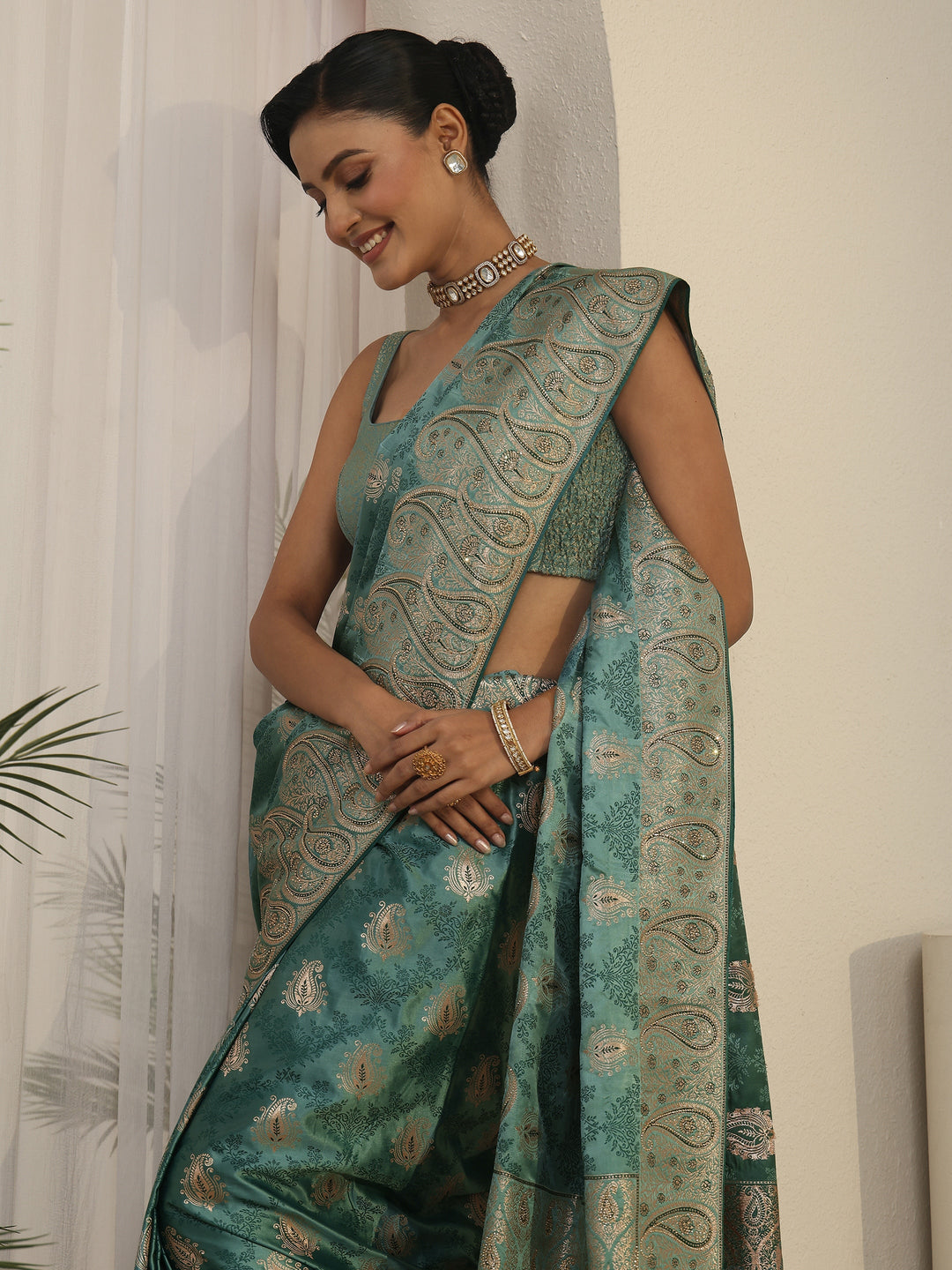 Libas Art Green Paisley Woven Design Satin Tassel Saree with Stone Work