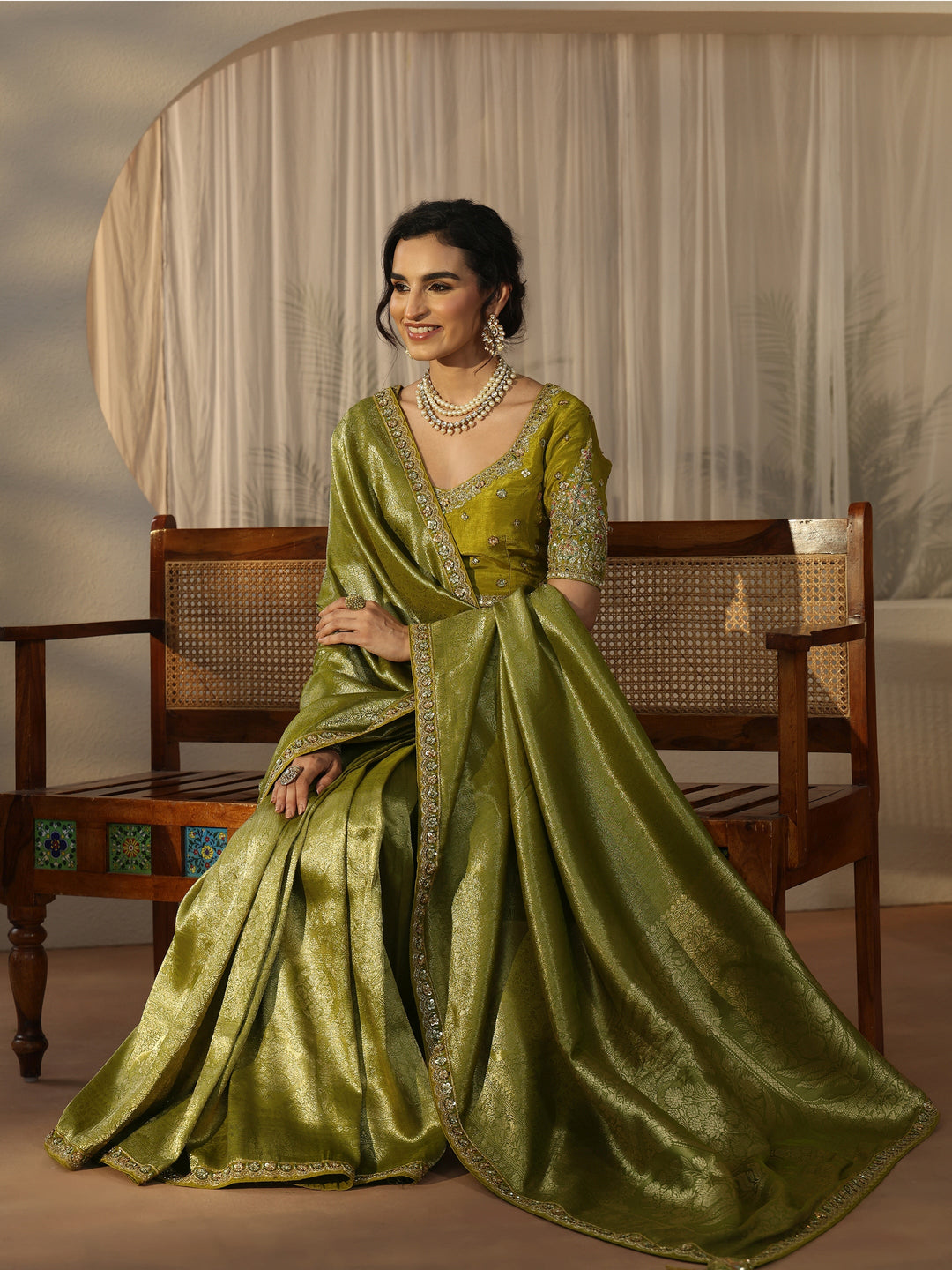  Libas Art Green Textured Silk Blend Saree with Embellished Border 