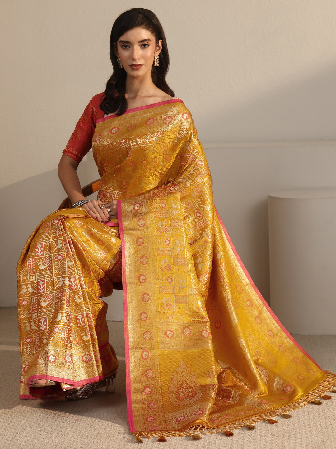 Libas Art Mustard Patola Woven Design Silk Blend Tassel Saree