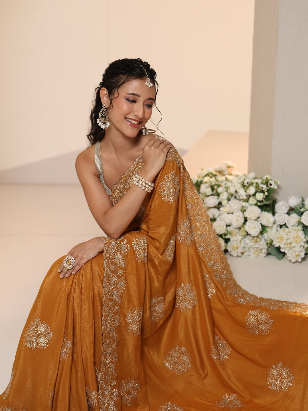  Libas Burnt Orange Satin Saree with Embroidered Floral Motifs 