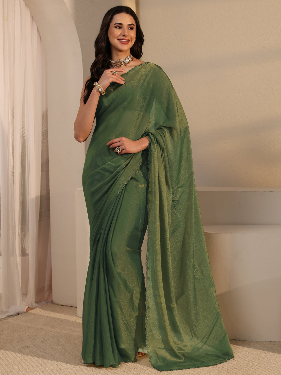  Libas Green Tissue Saree with Embellished Border 