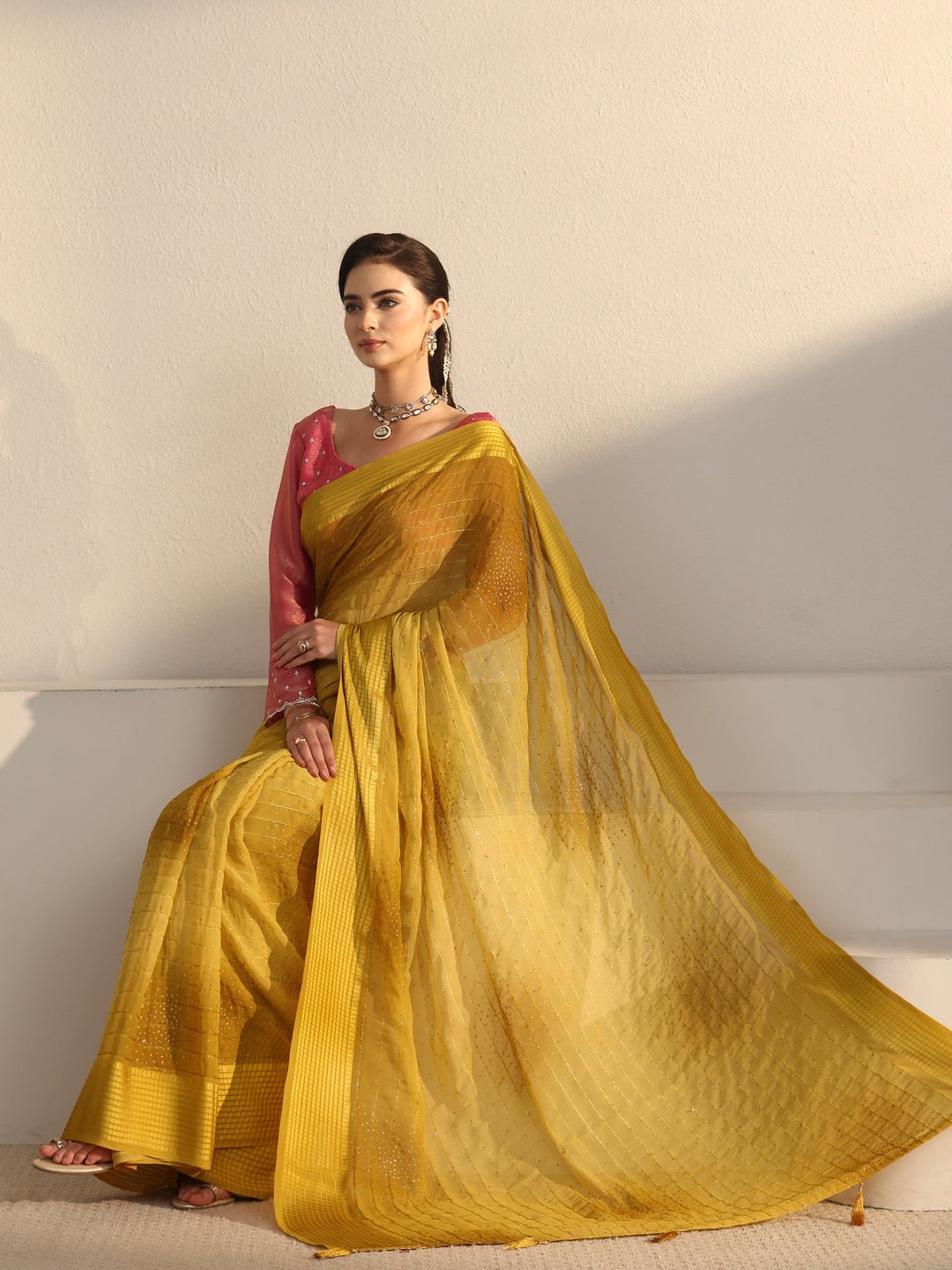 Libas Mustard Striped Georgette Tassel Saree with Embellishments