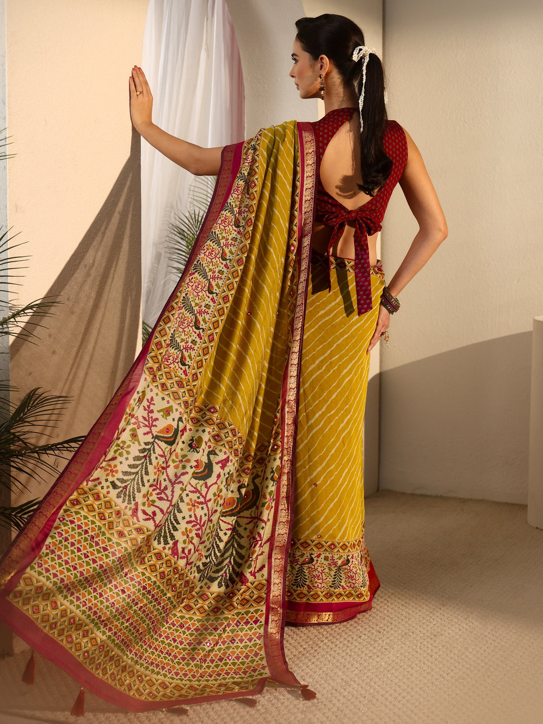 Libas Mustard and Red Leheriya Printed Silk Blend Tassel Saree
