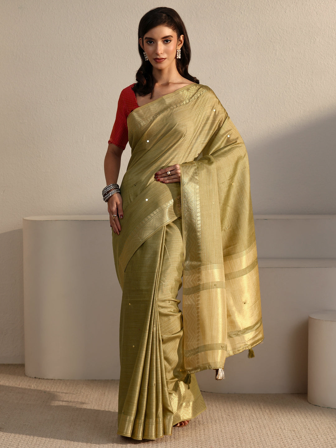 Libas Pista Green Woven Design Silk Blend Tassel Saree