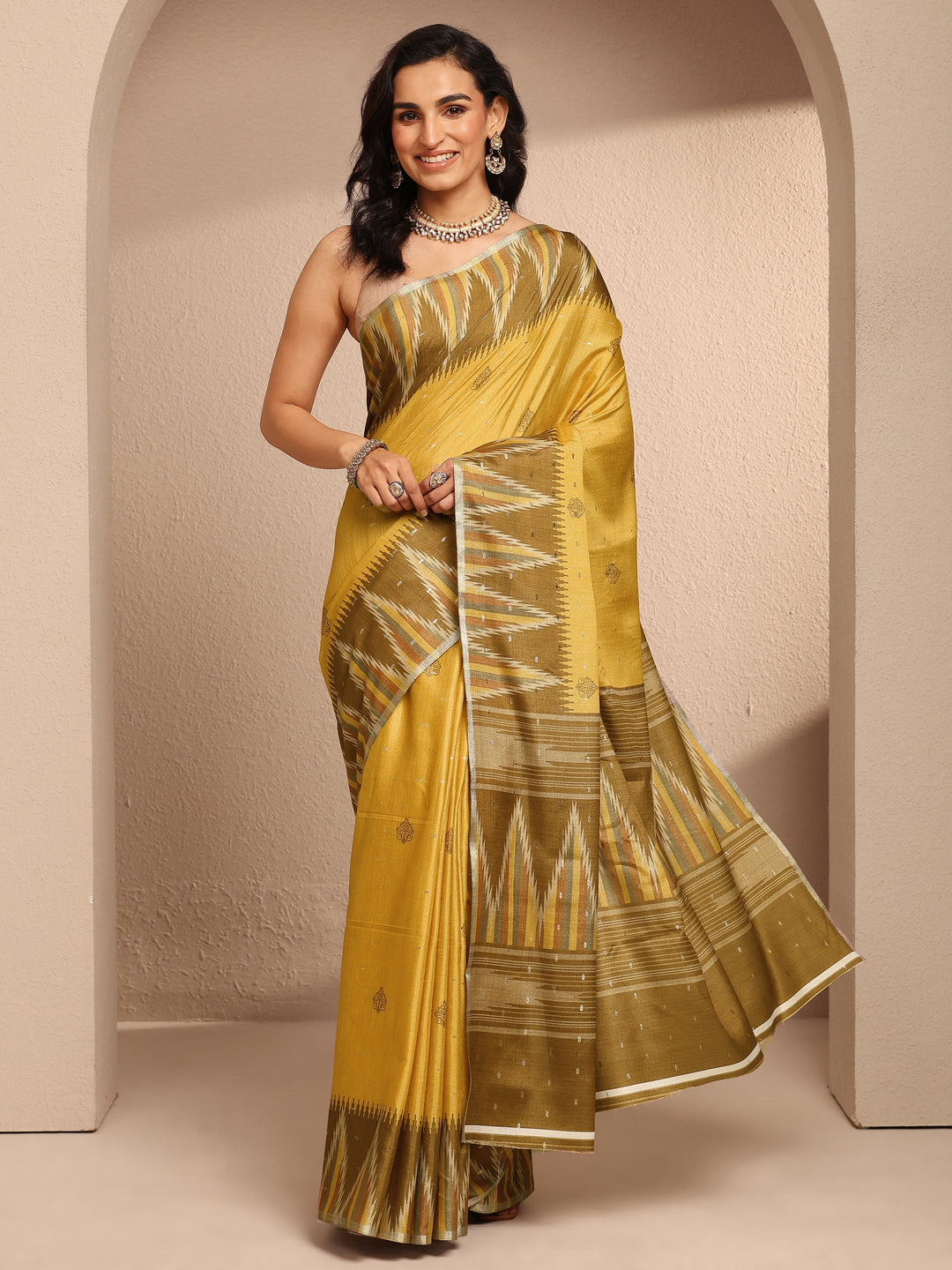 Mustard Ikat Printed Silk Blend Saree With Unstitched Blouse Piece