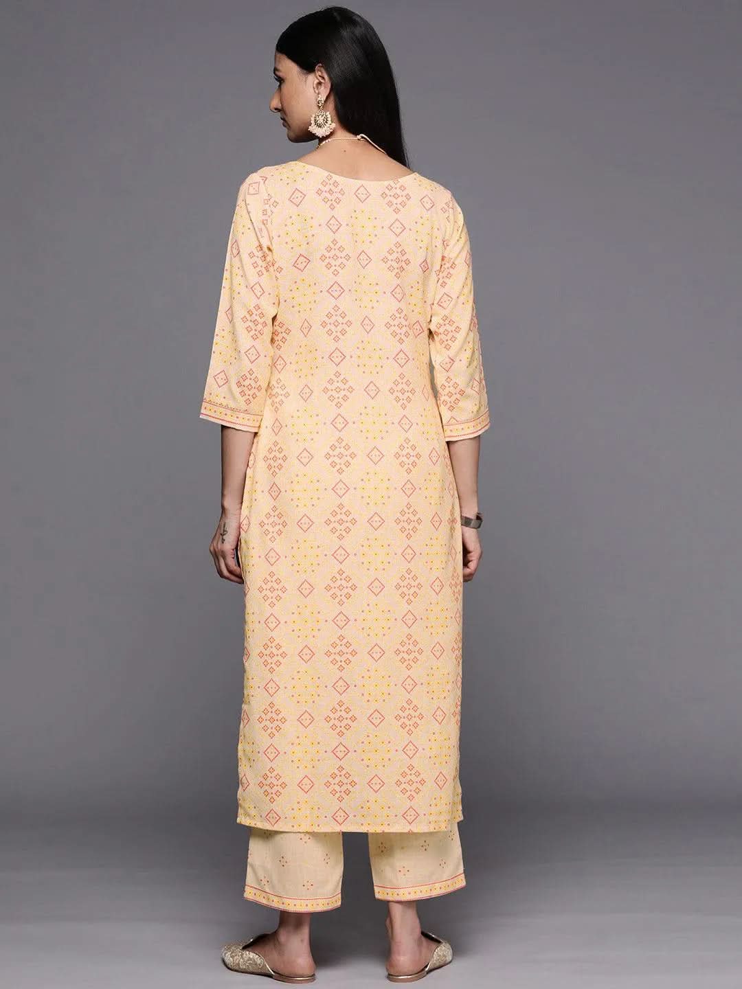 

Beige Printed Cotton Straight Kurta With Trousers