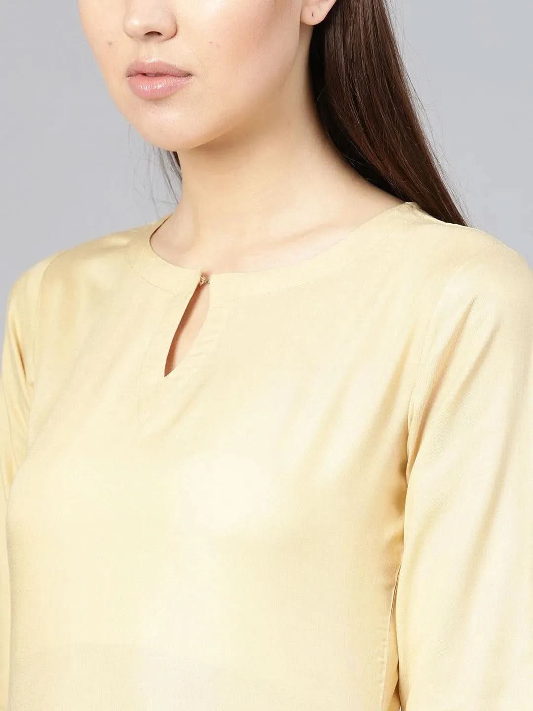

Beige Solid Rayon A-Line Kurta With Palazzos
