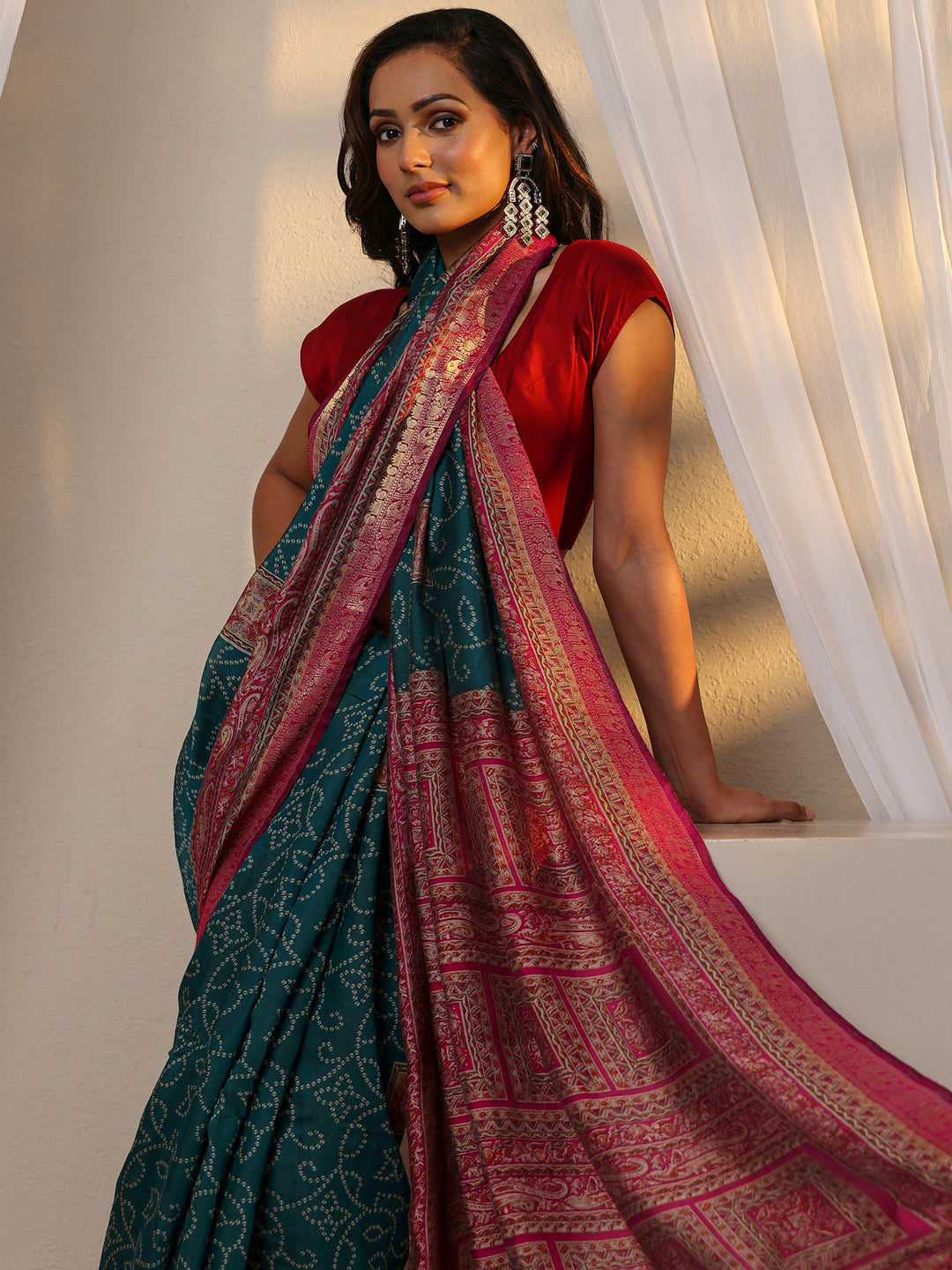 Blue Bandhani Printed Silk Blend Saree 
With Unstitched Blouse Piece