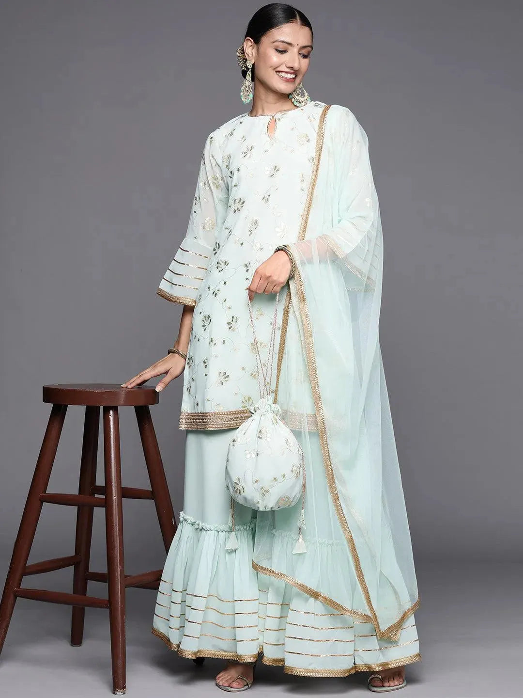 Blue Printed Georgette Straight Suit Set With Potli - Libas 