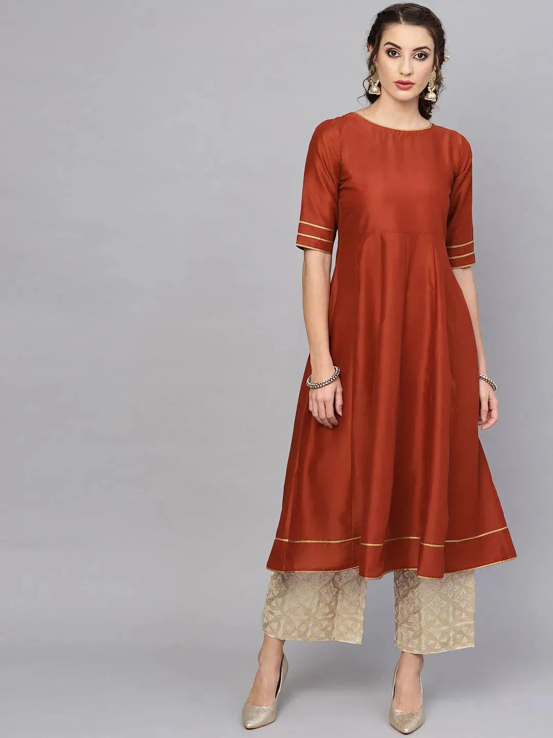

Brown Solid Muslin Anarkali Kurta With Palazzos